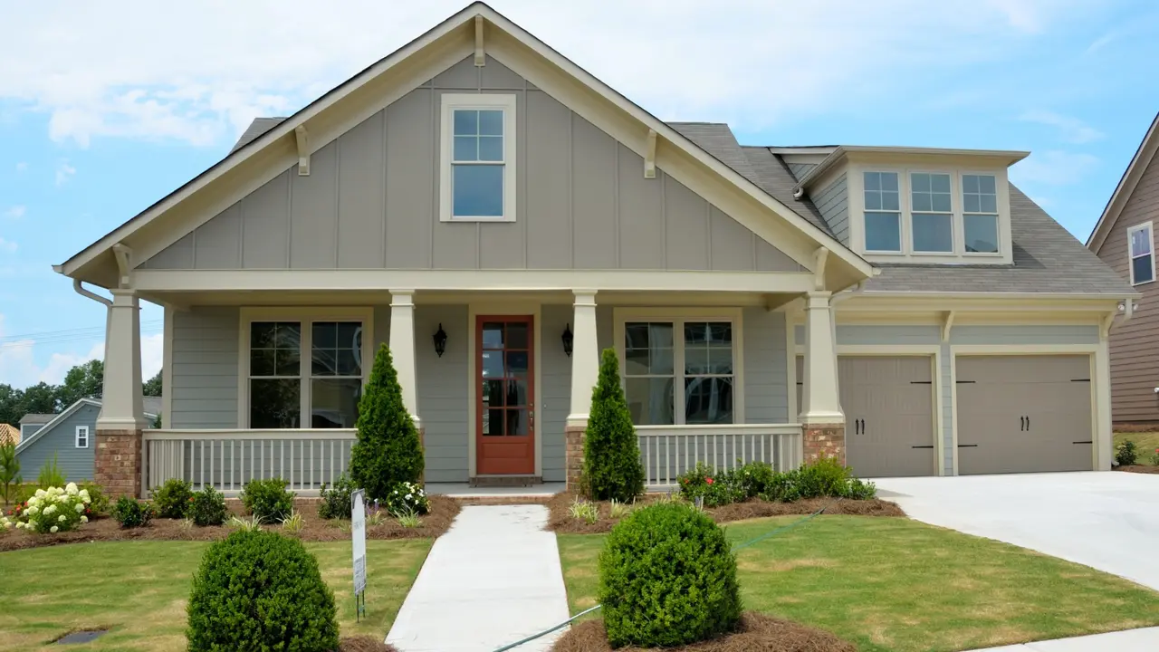 Two mint chocolate milkshakes with whipped cream and green sprinkles.
